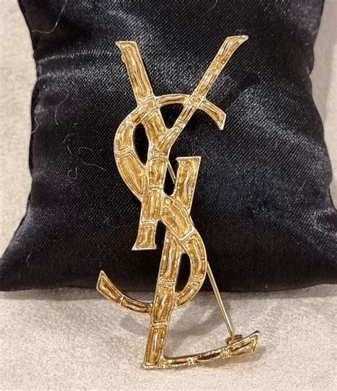 ysl brooch black|ysl brooch price.